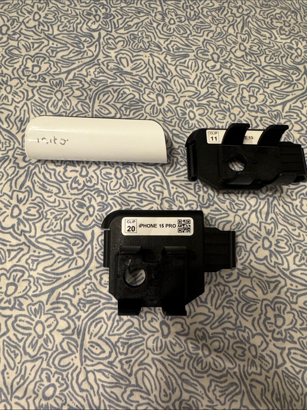 Inito fertility monitor with iPhone 13 & iPhone 15 pro clips